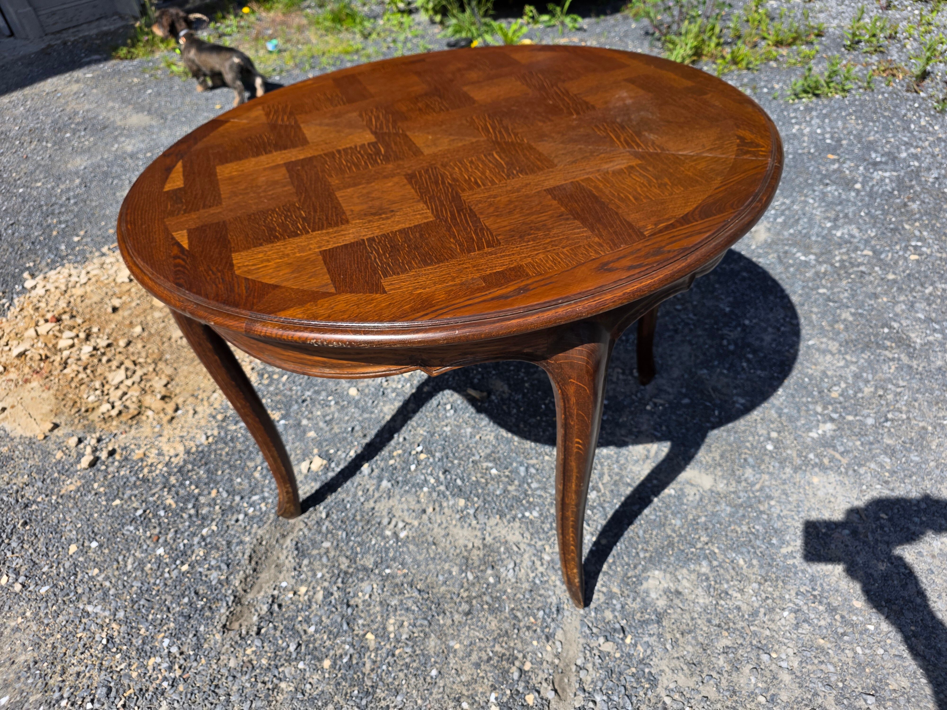 Extendable table in Louis XV style in oak (2 extensions)