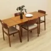 Danish teak extending dining table on solid wood legs, 1970s
