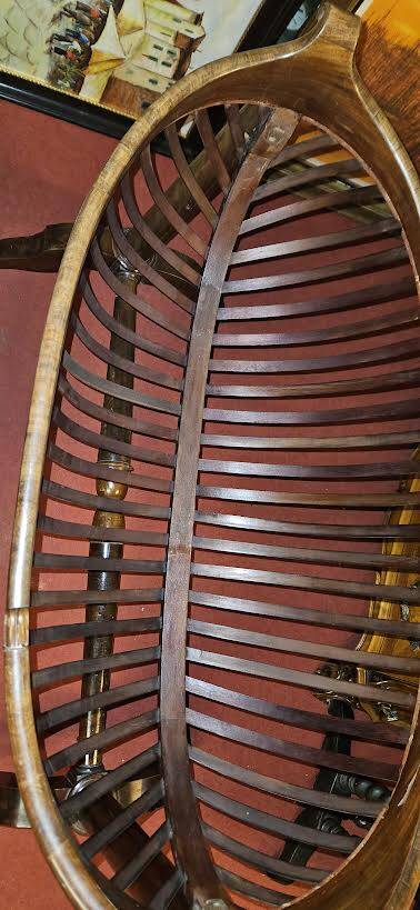 Empire style mahogany cradle with a swan neck, shaped like a cradle, circa 1810