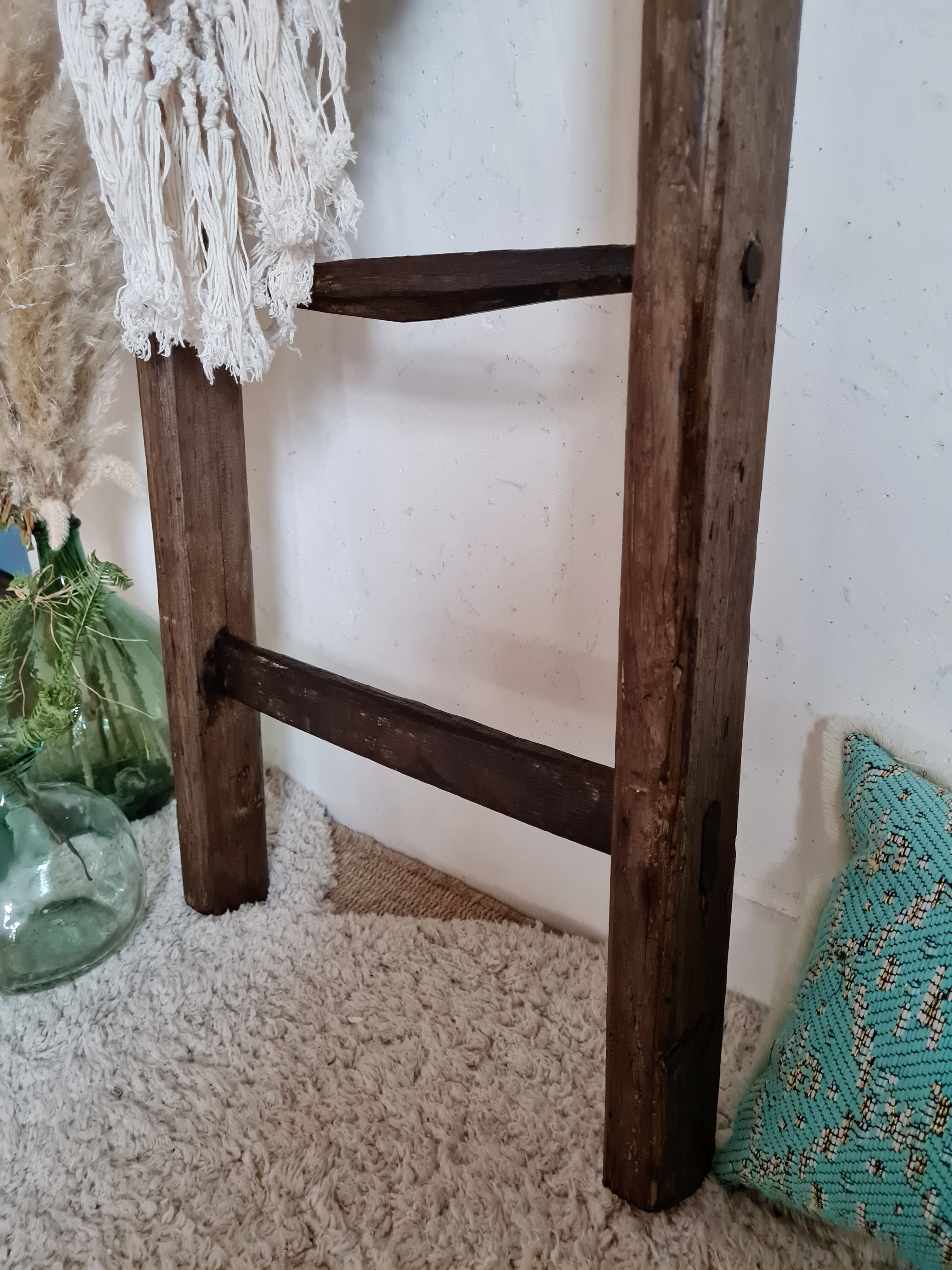Old wooden farm ladder