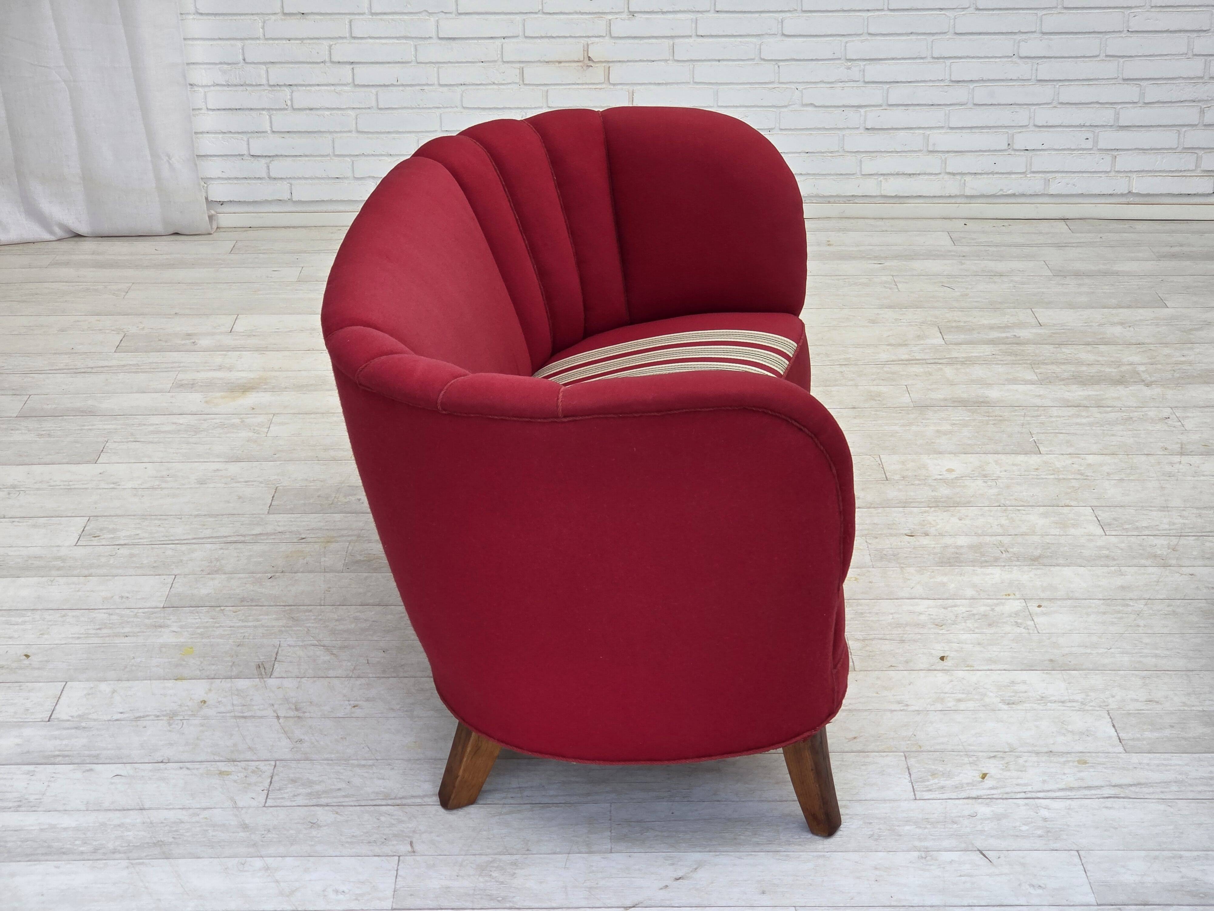 1960s, Danish 2-seater "Banana" sofa, furniture wool, oak wood legs.