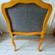 Louis XV style chair trim lined with a mottled grey wool, medium oak waxed finish