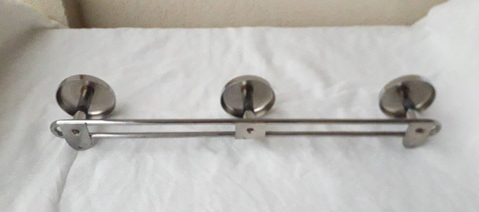 Chrome metal wall coat rack