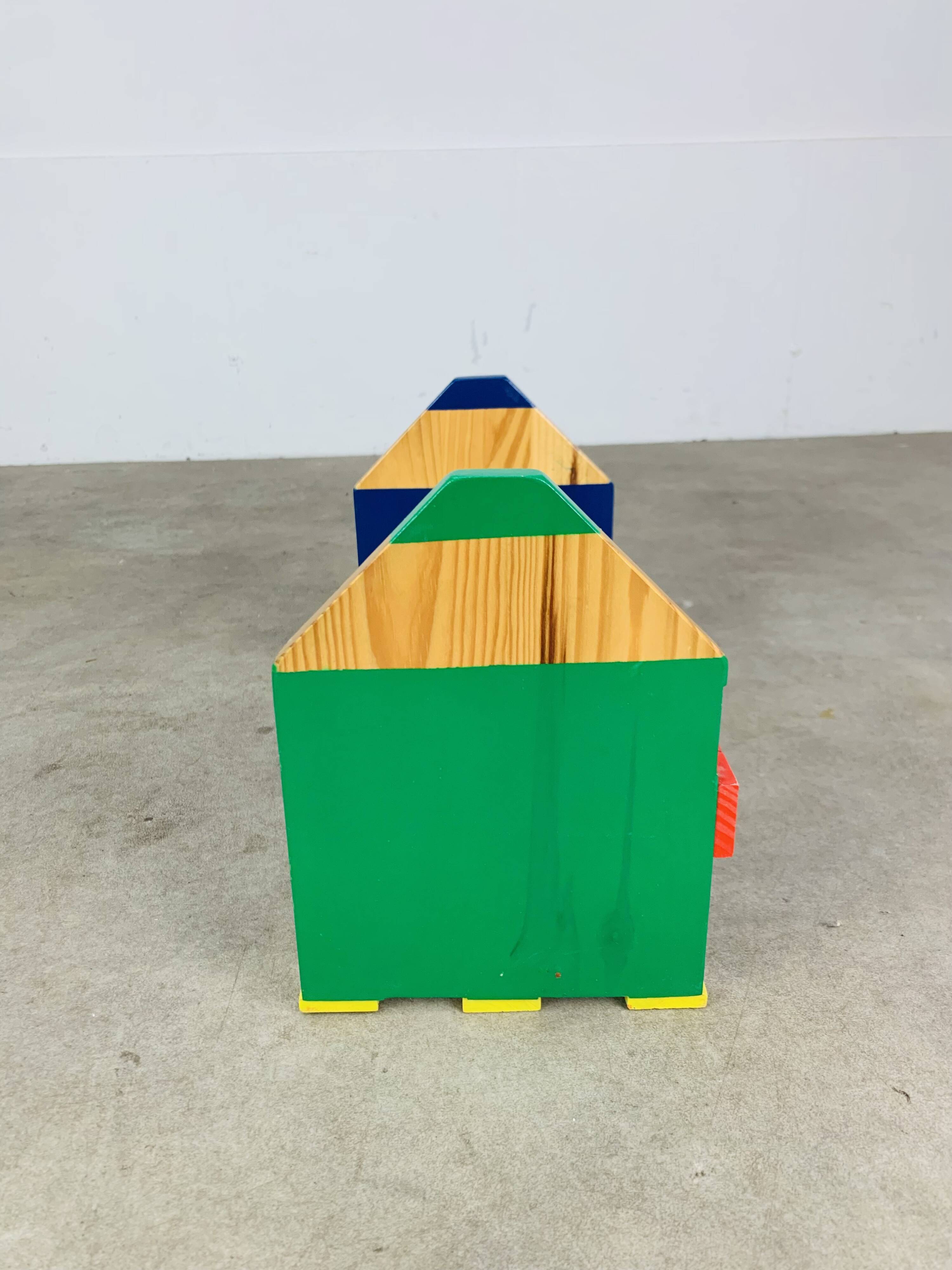 Wall-mounted pencil shelf for children, Pierre Sala style.