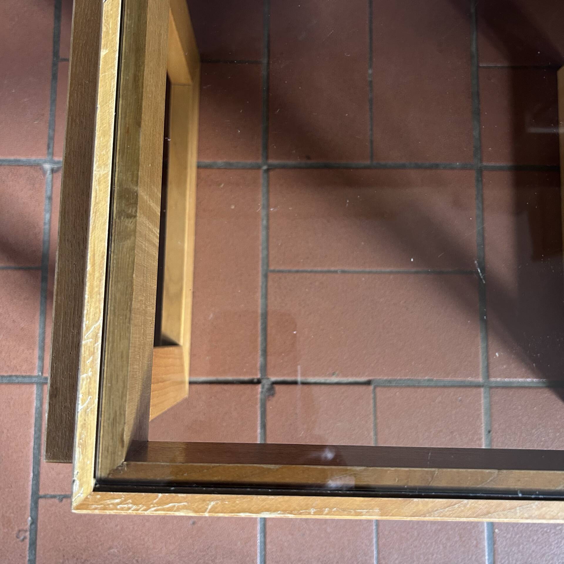 Modernist side table in wood and smoked glass