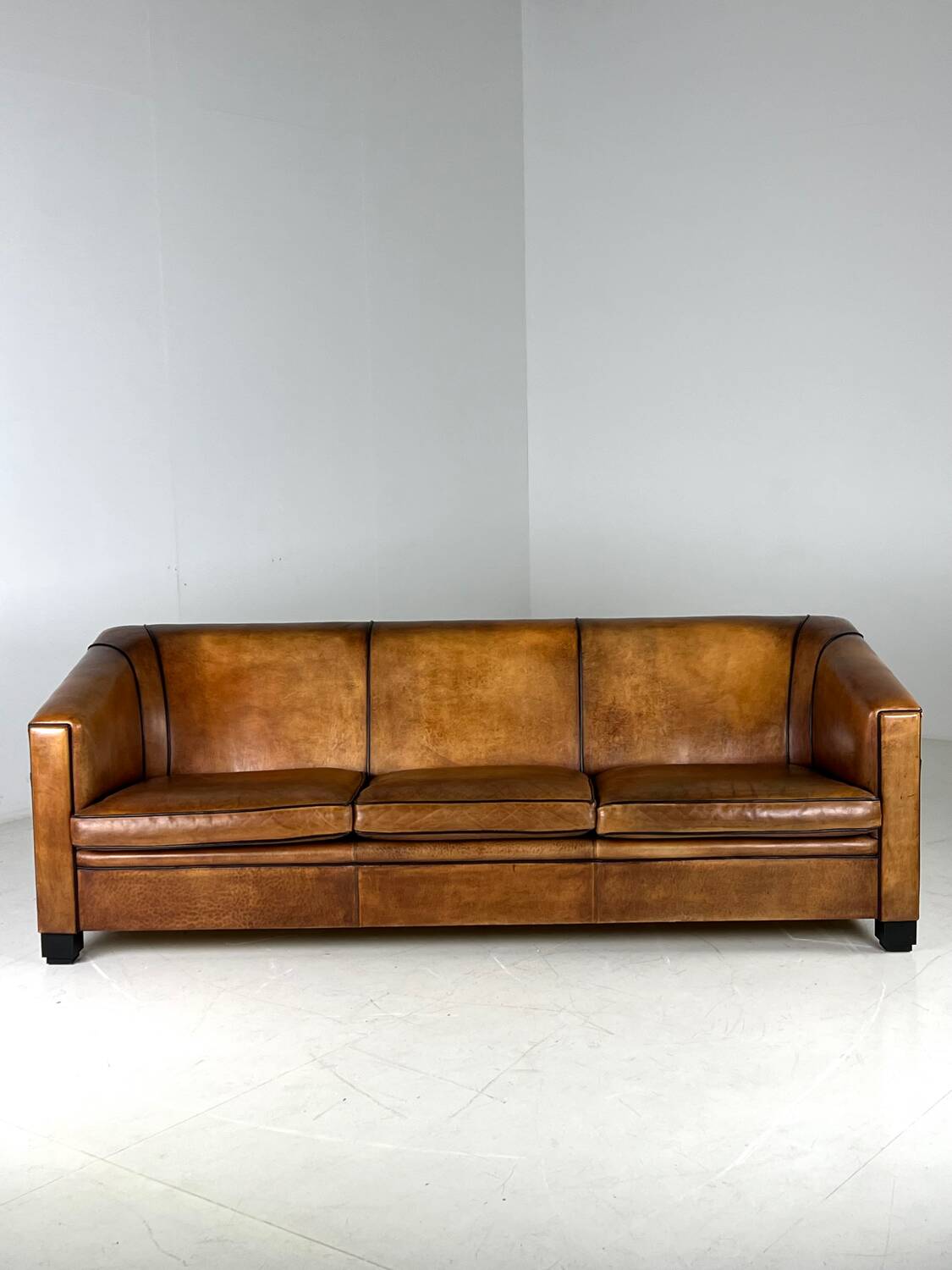 Art deco sofa sheep’s leather