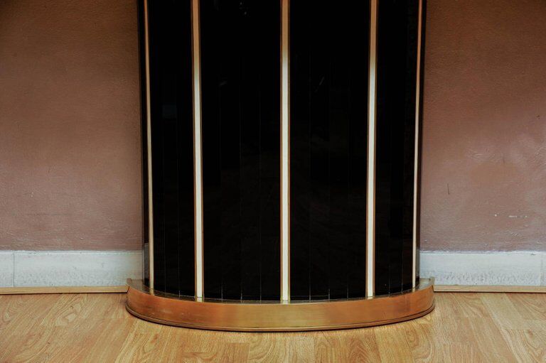 Console in black and cream tinted glass