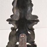 Pair of bronze andirons with black patina, 19th century, female caryatids