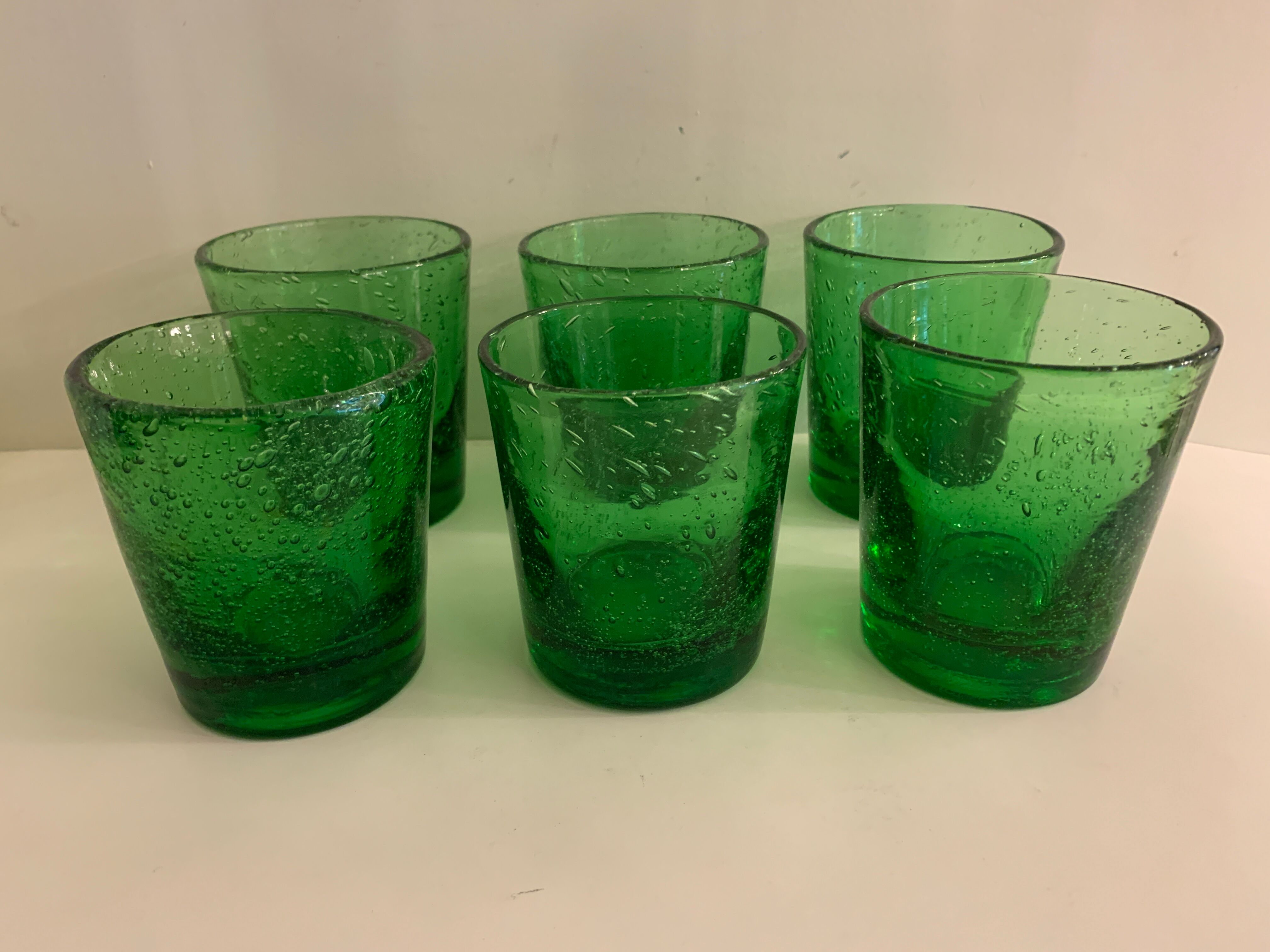 6 green whiskey glasses, bubbles and Biot soufflés