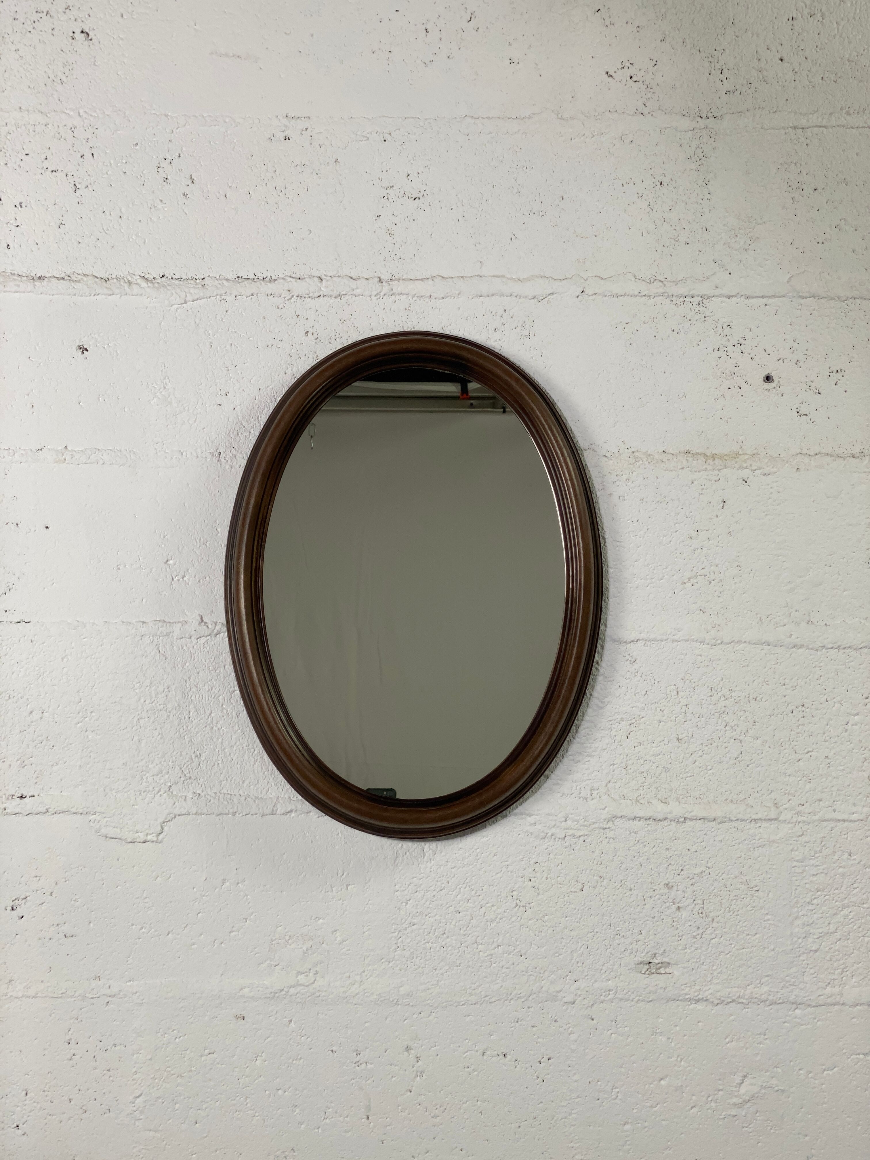 Oval wooden mirror