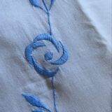 Embroidered cotton linen sheet with blue border