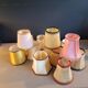 Set of 13 vintage clip-on lampshades