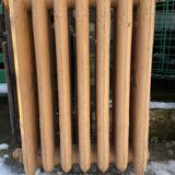 Antique radiator on feet with seven floral cast iron blades, 20th century
