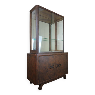 Art Deco period bookcase in lacquered wood with a faux appearance of rust-patinated sheet metal circa 1930-1940