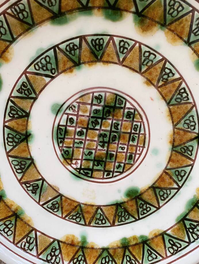 Plate with scarified decoration, signed CHS, Cyprus
