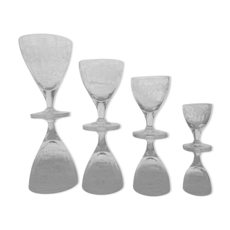 Service of 39 engraved foot glasses with Venetian moldings