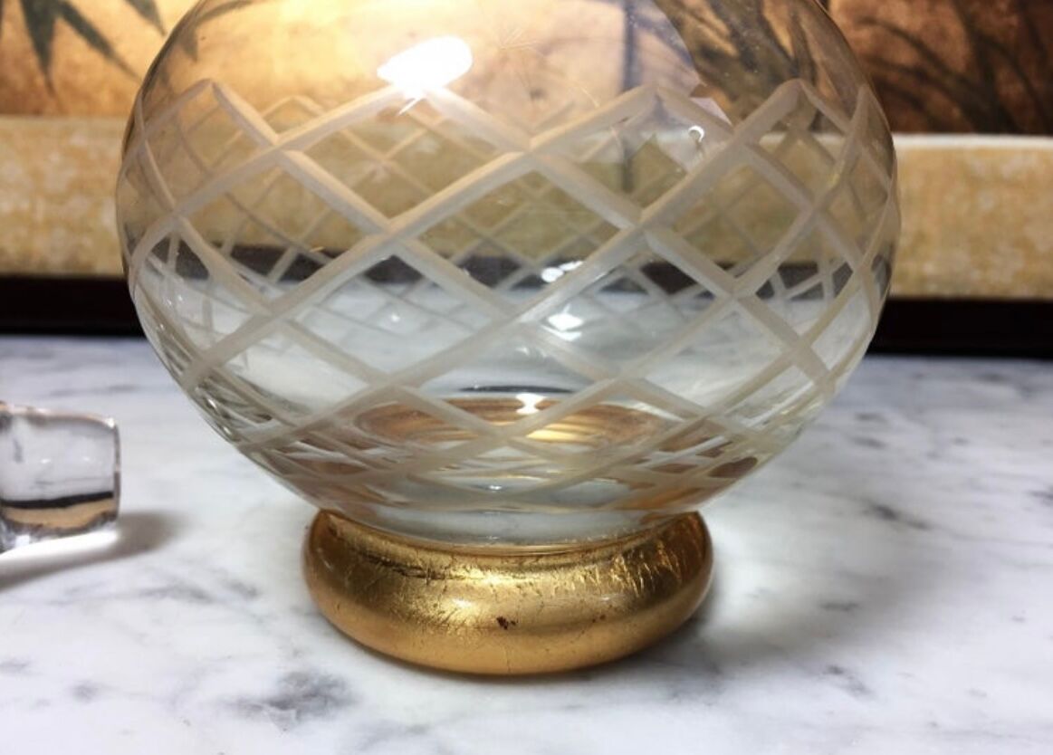 Carafe in chiseled and gilded glass, Circa 1940