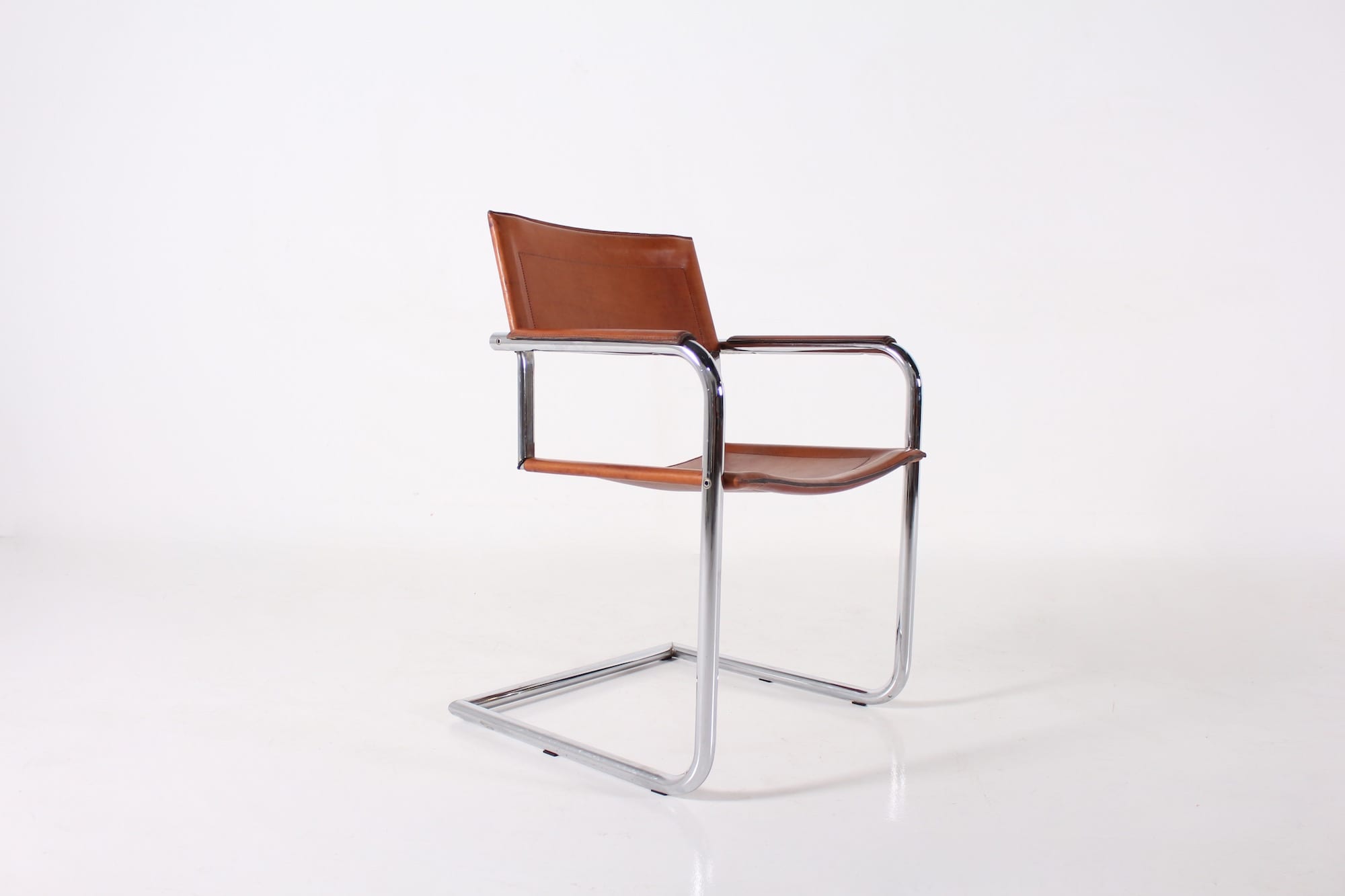 4 Matteo Grassi leather cogna cantilever armchairs