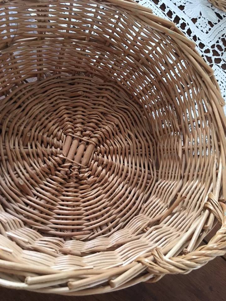 Three natural wicker baskets