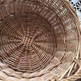 Three natural wicker baskets