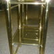 Glass and brass bedside tables