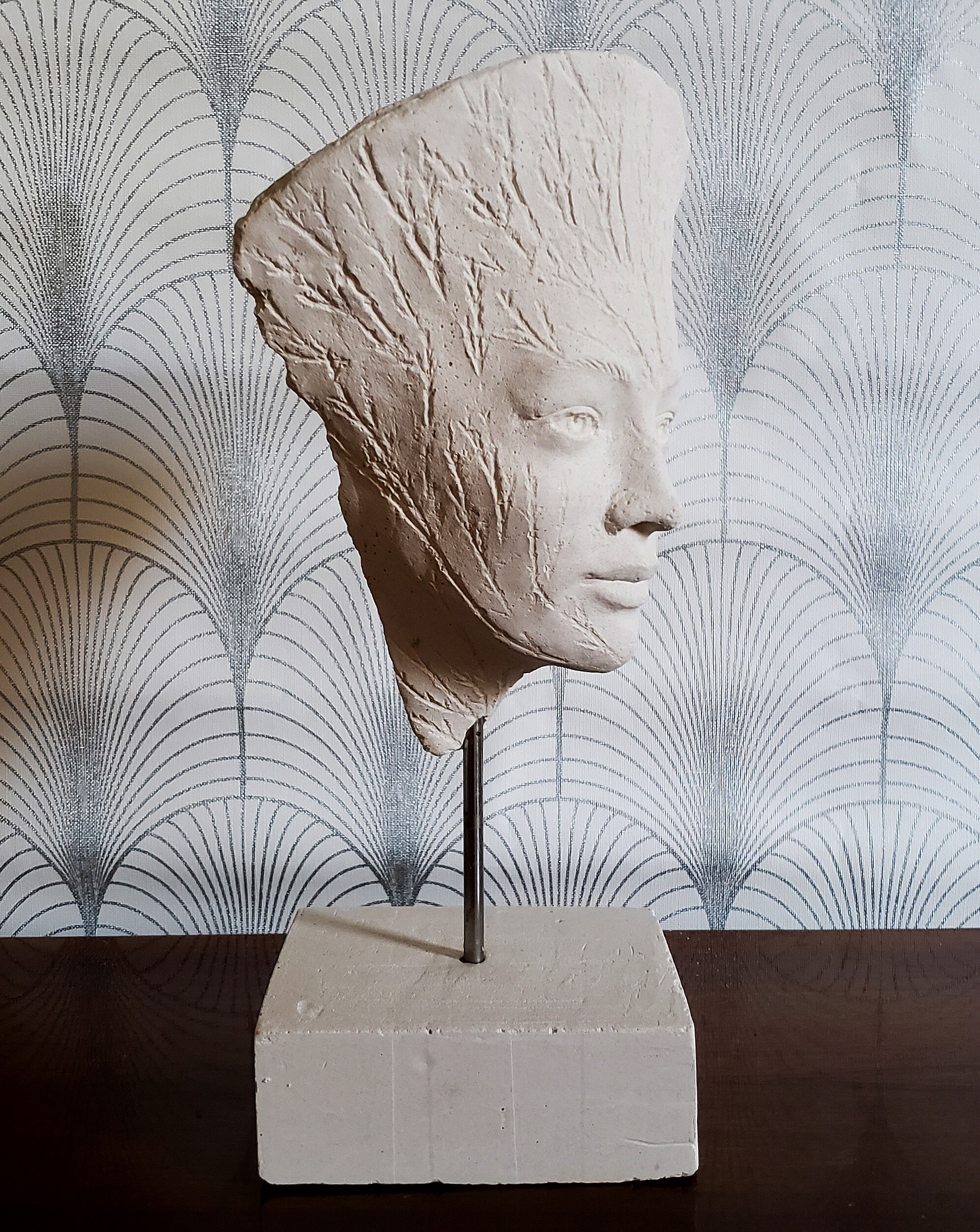 Head on plaster base