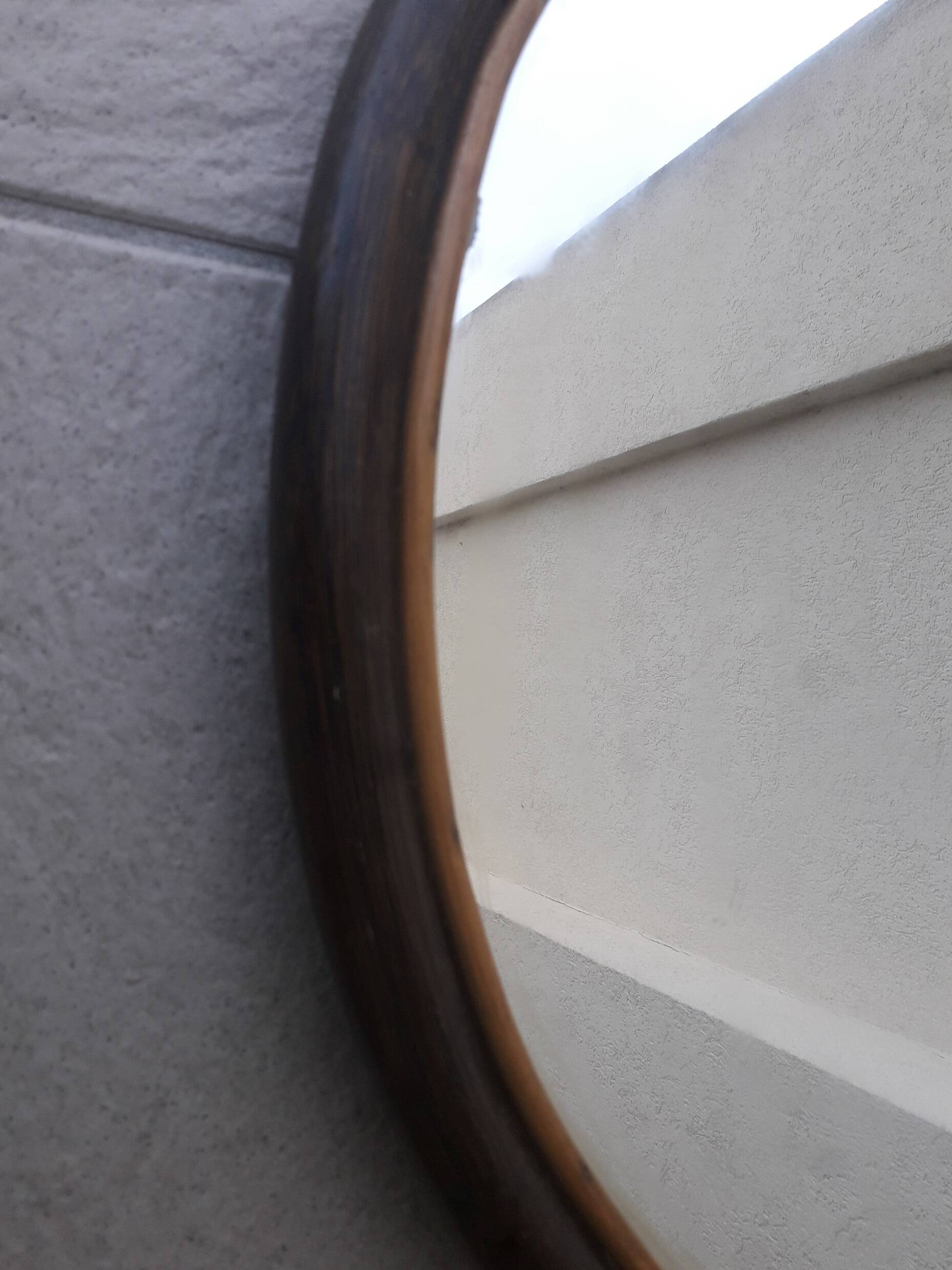 Round wooden mirror