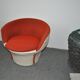 Set of 2 vintage 1970s tub chairs in brown, red, and white fabric with a enveloping silhouette.