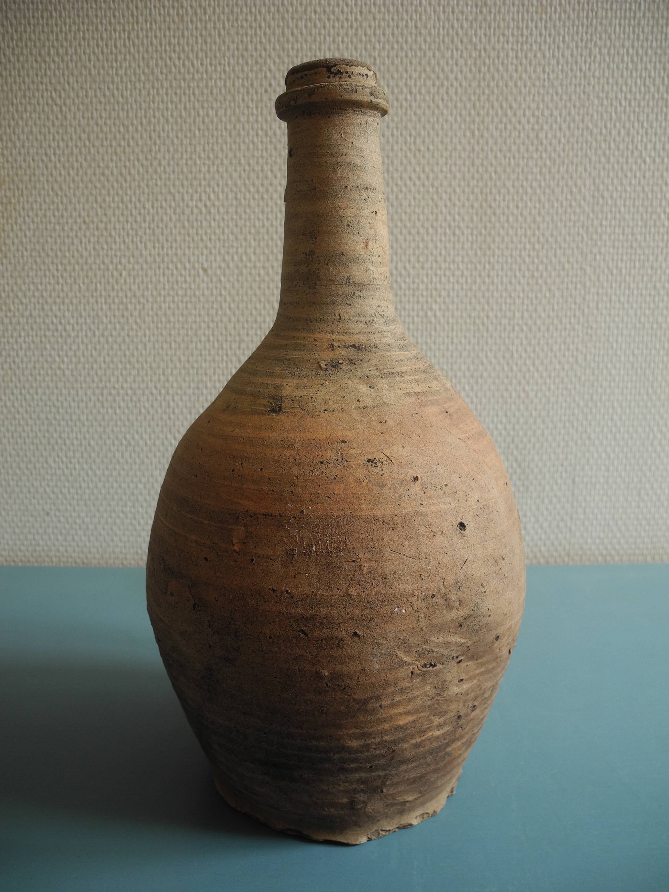 antique rustic decorative terracotta pottery bottle