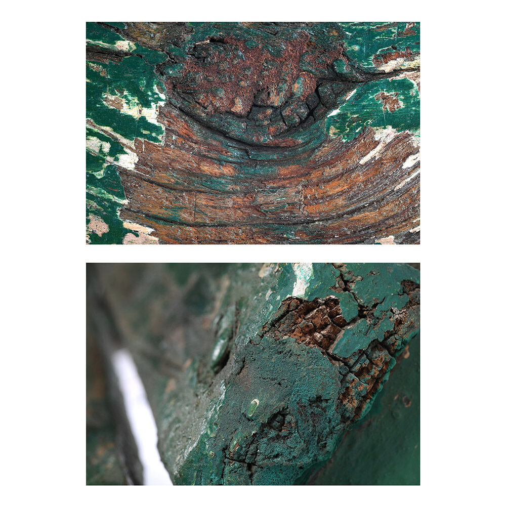 Wooden bench with green patina