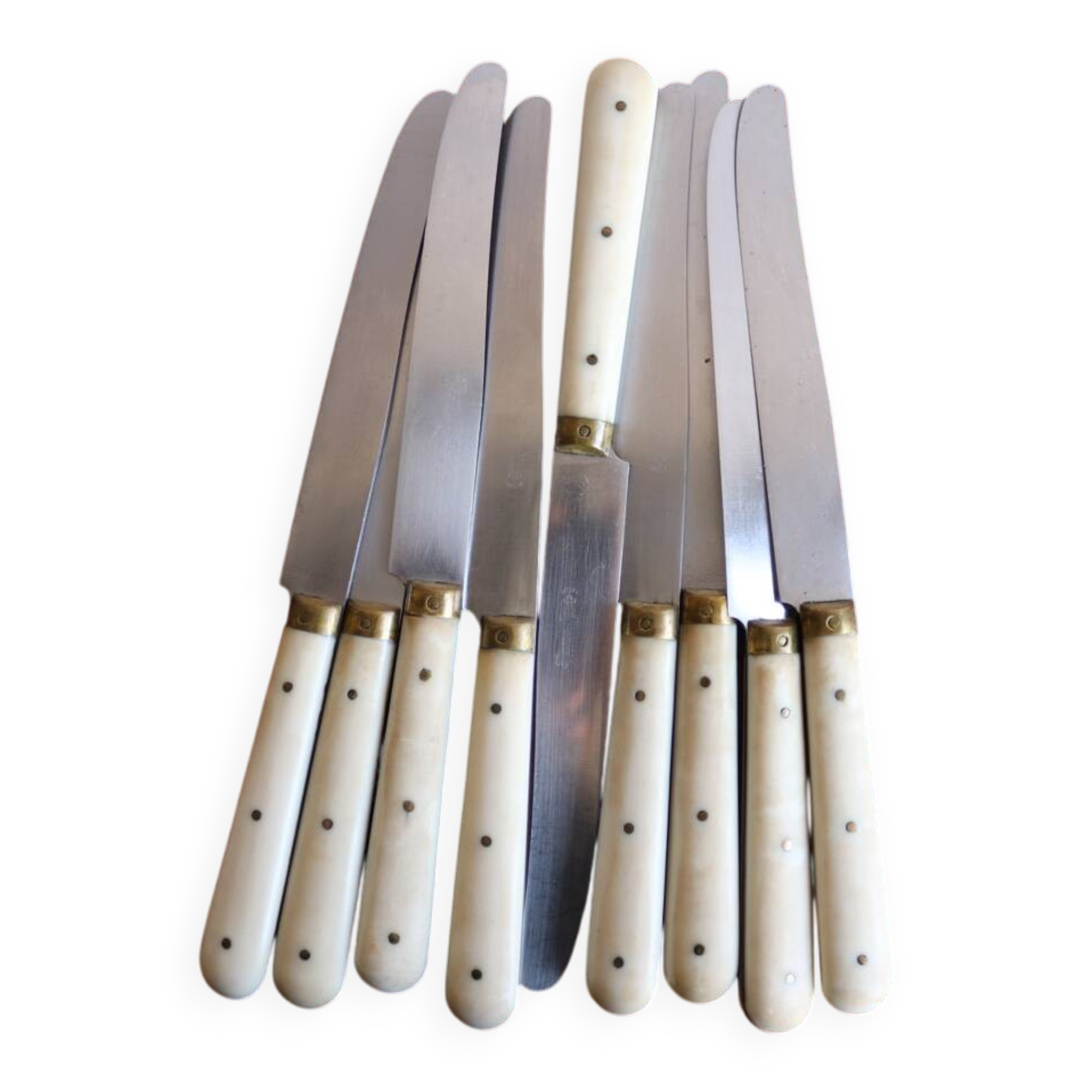 Set of 9 vintage cream table knives