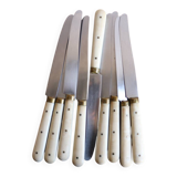 Set of 9 vintage cream table knives