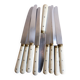 Set of 9 vintage cream table knives