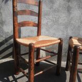 Pair of mulched brutalist chairs and wood