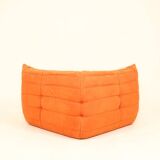 Togo sofa set and armchairs in pumpkin orange, 3 pieces, no label.