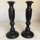 Pair of large black metal candlesticks