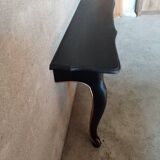 Large console in blackened wood