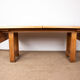 Large extendable dining table in solid oak by Guillerme and Chambron.