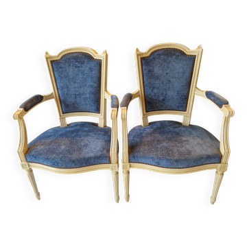 Pair of Louis XVI cabriolet armchairs in cream and blue French elegance late 19th century