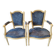 Pair of Louis XVI cabriolet armchairs in cream and blue French elegance late 19th century