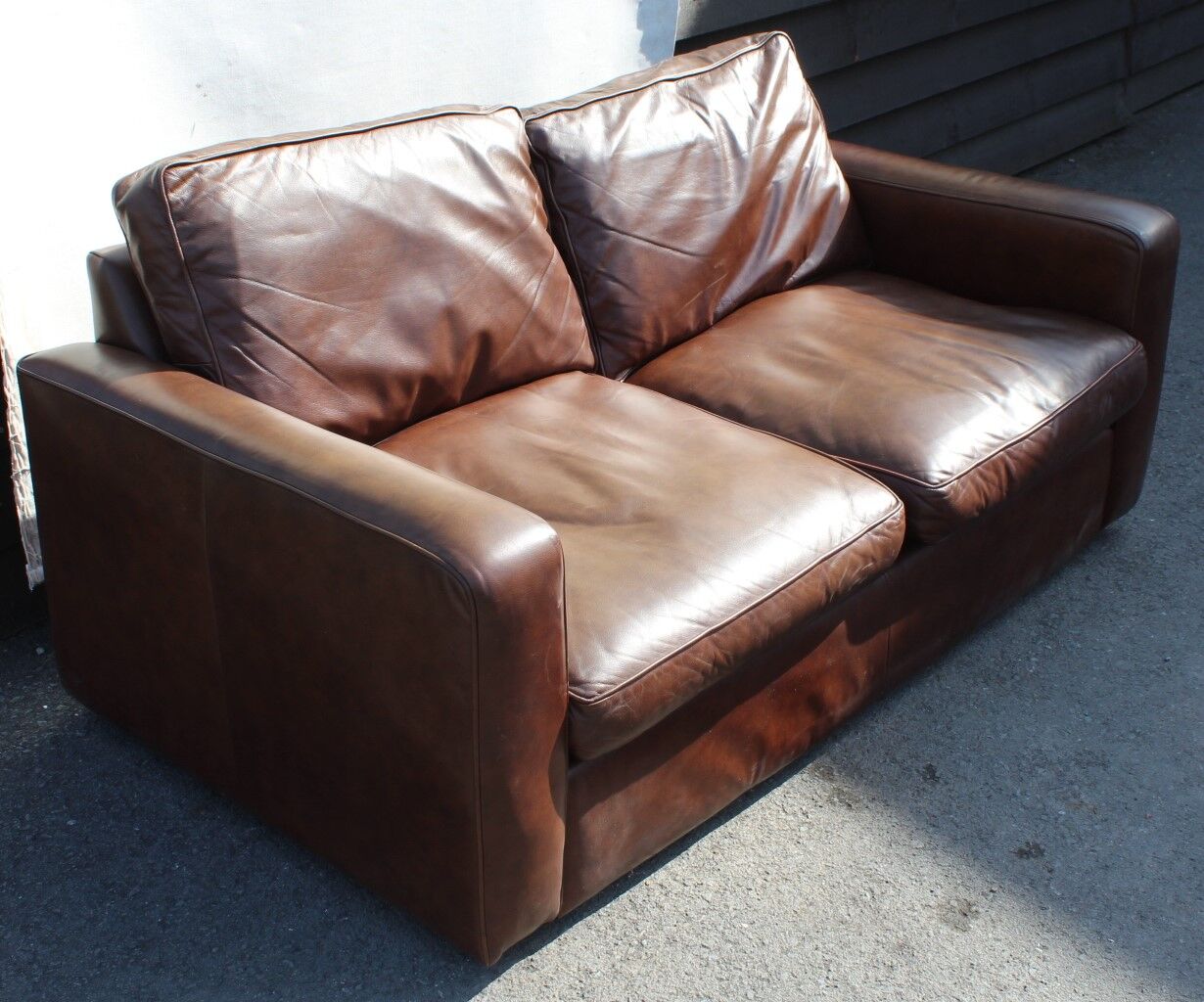 Two seater light brown sofa