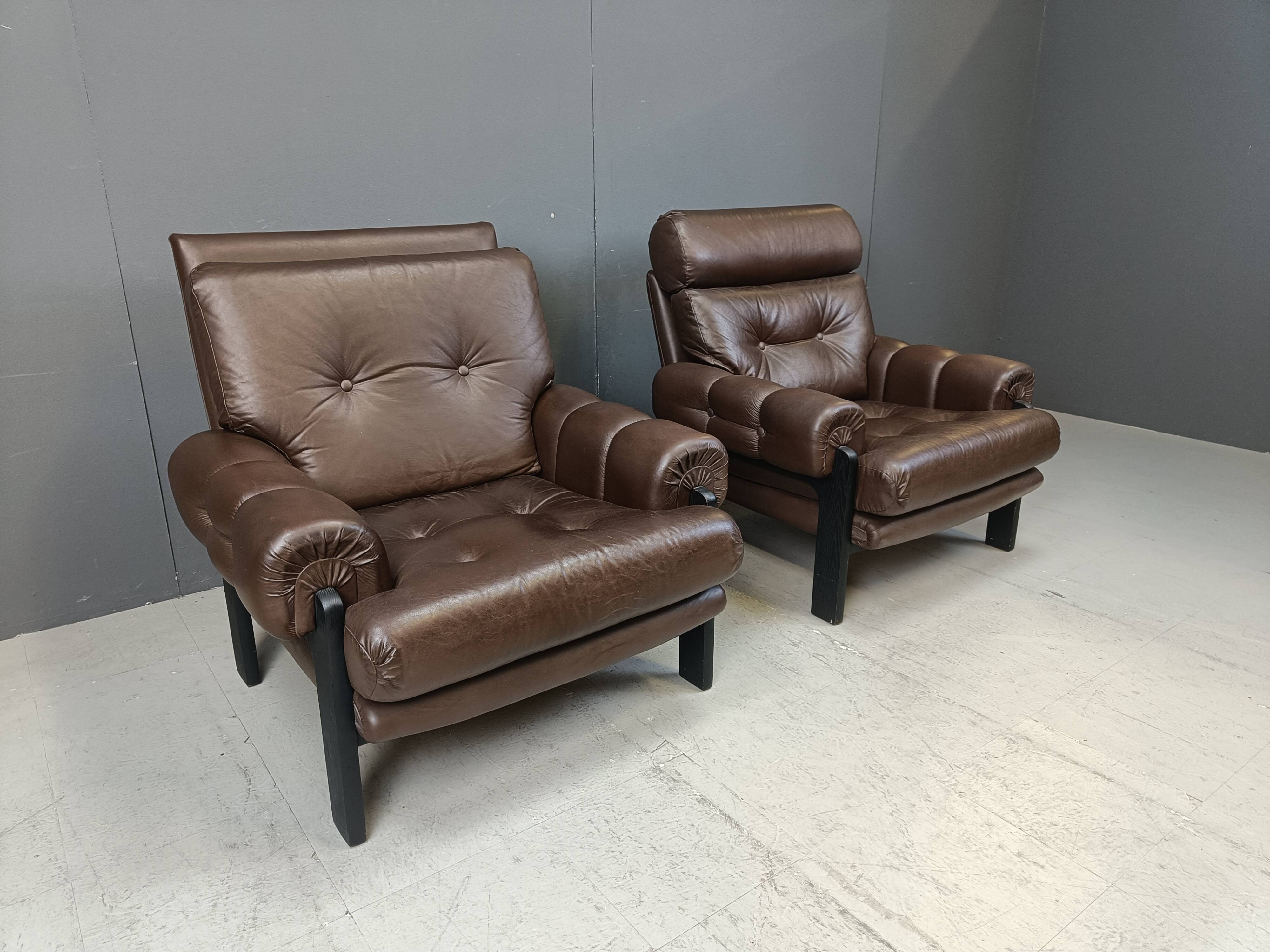 Pair of leather armchairs made in Denmark, 1960s