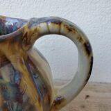 Ceramic pitcher in the shape of a coloquinte melo.