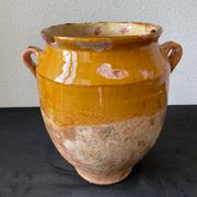 Old grease pot in glazed yellow terracotta, France nineteenth century
