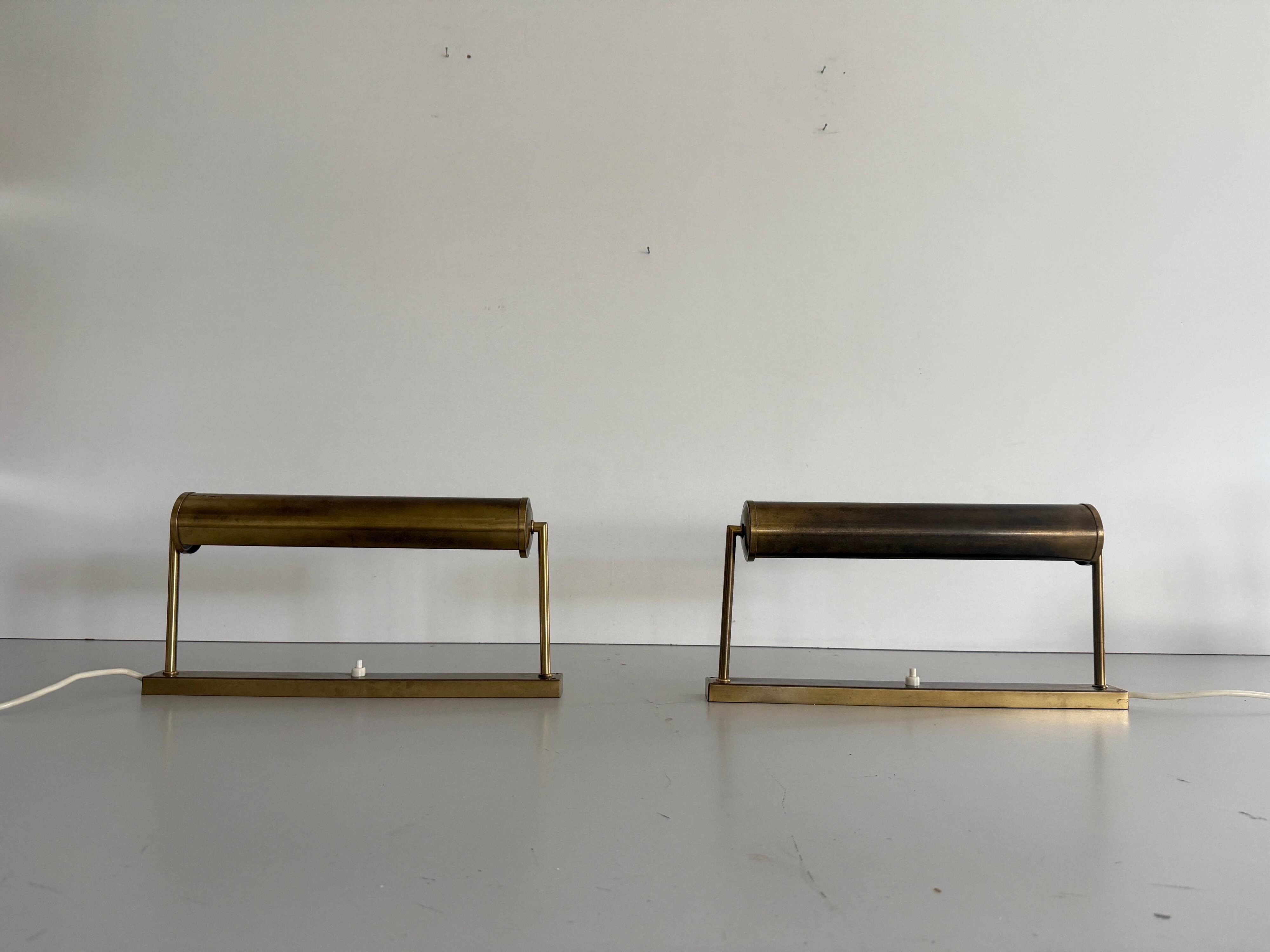 Pair of brass wall lights with adjustable heads from the mid-20th century, 1960, Germany.