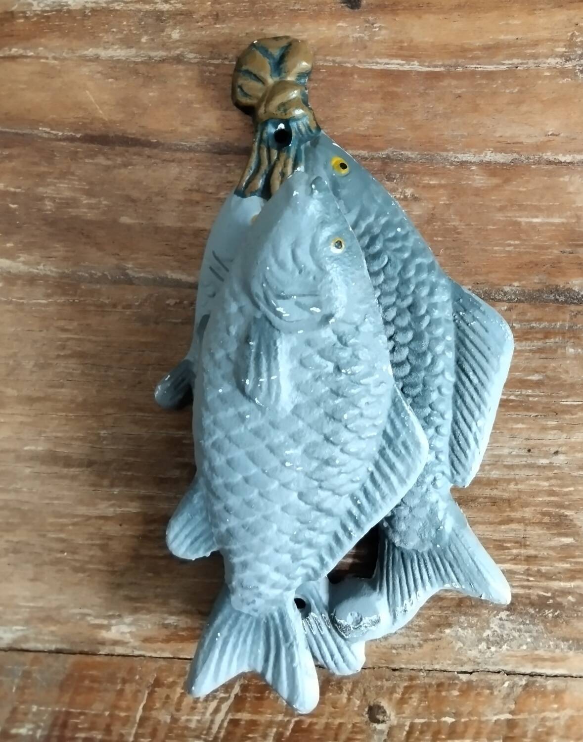 Heurtoir en fonte trio de poissons