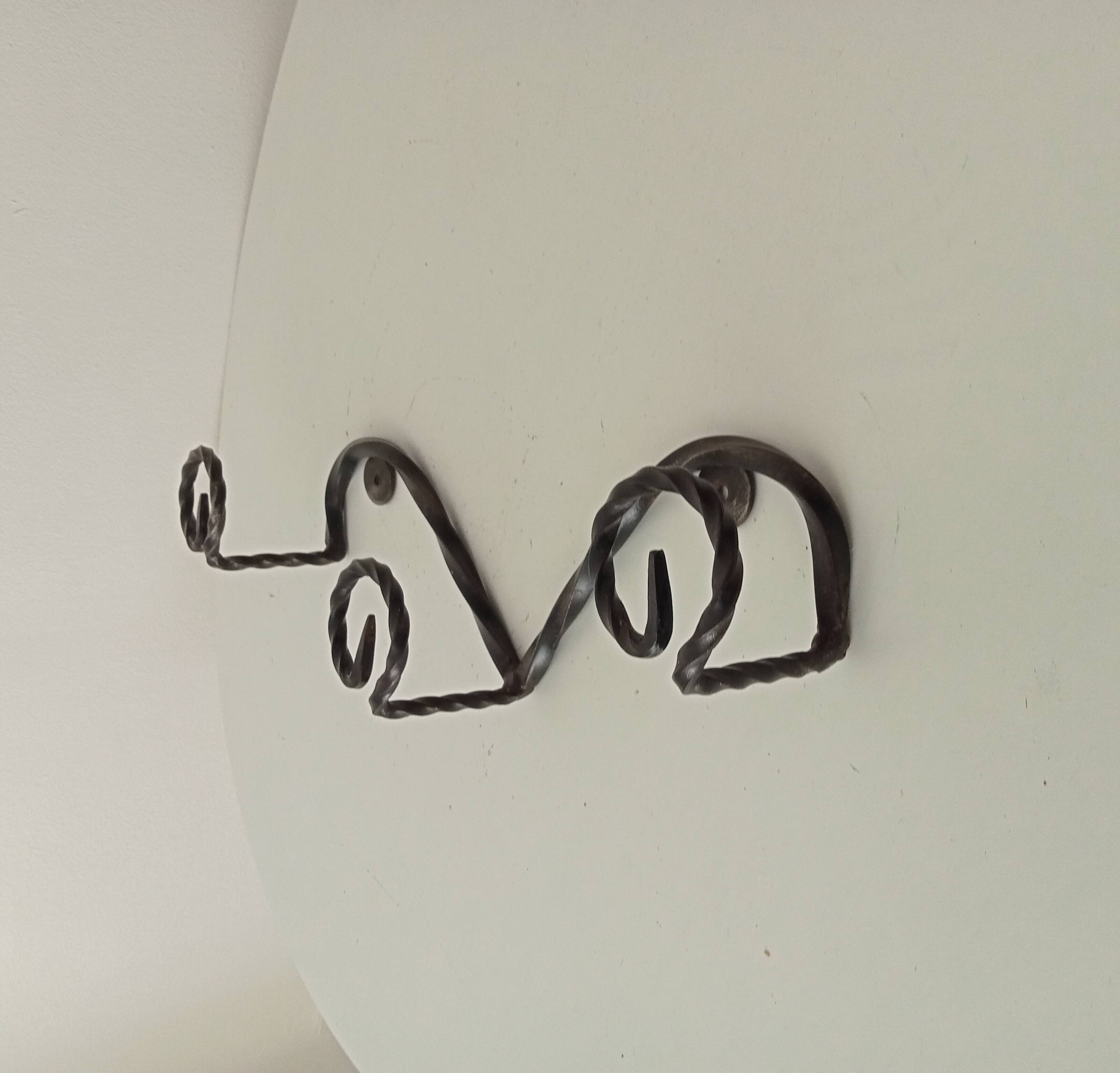 Vintage wrought iron wall coat rack