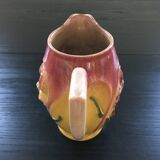 Old pitcher with pink iris decor