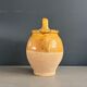 Ancient oil jar in glazed terracotta