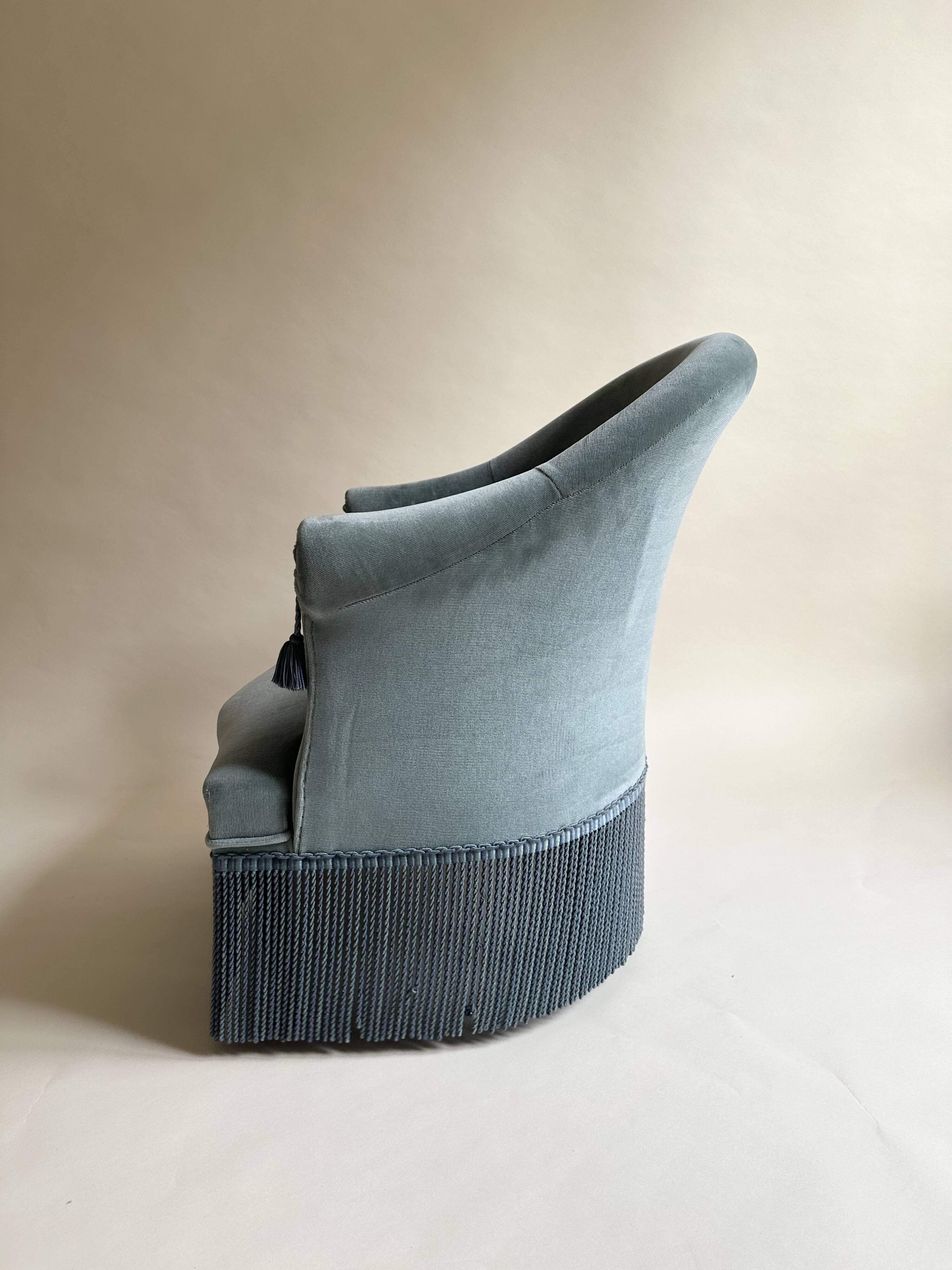 Blue velvet frog armchairs